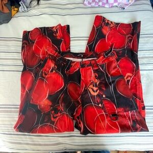 Dolls Kill wide leg Pennywise pants.